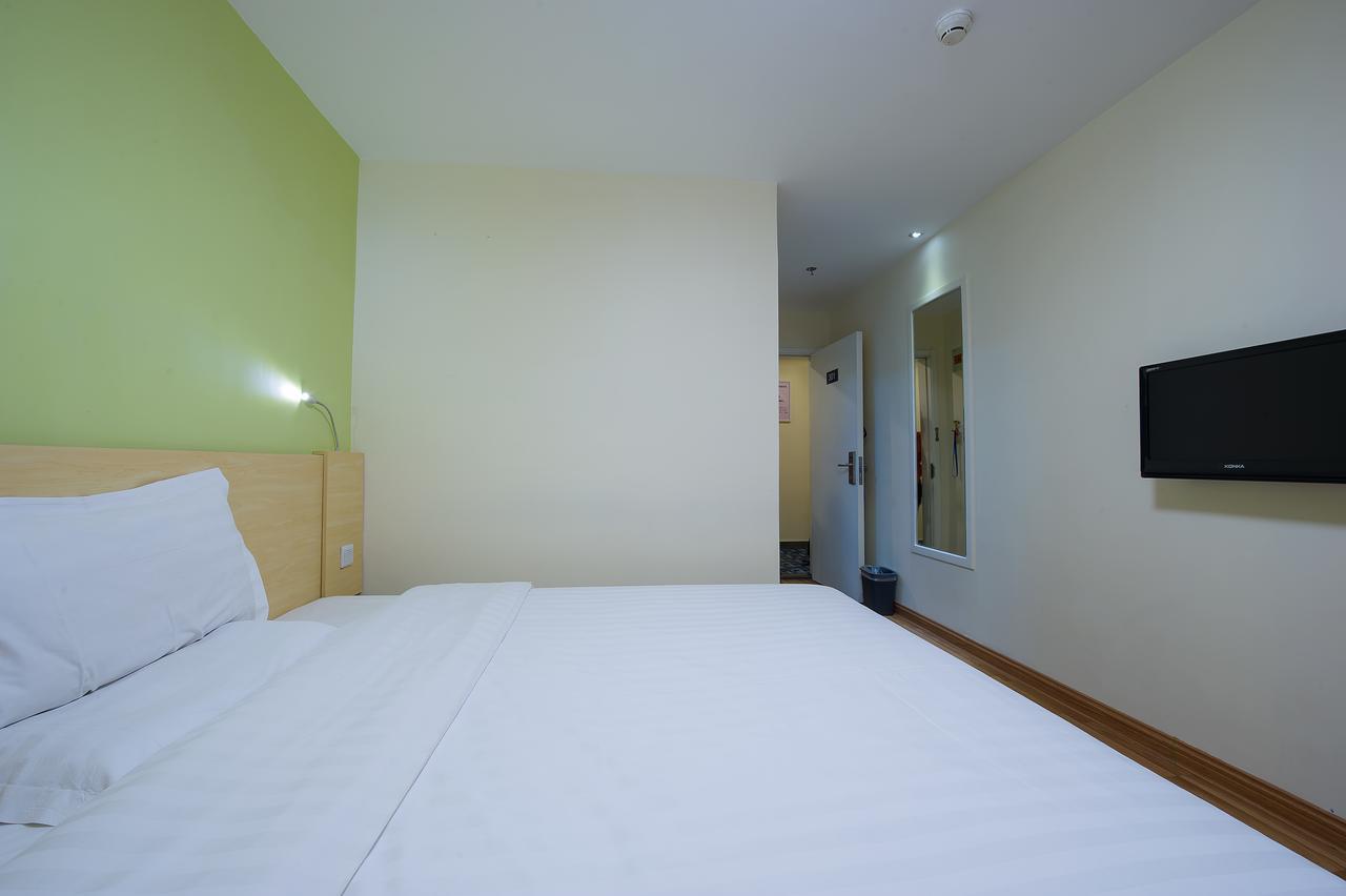 7Days Inn Qingdao Shandong Raod Zhenning Overpass Экстерьер фото